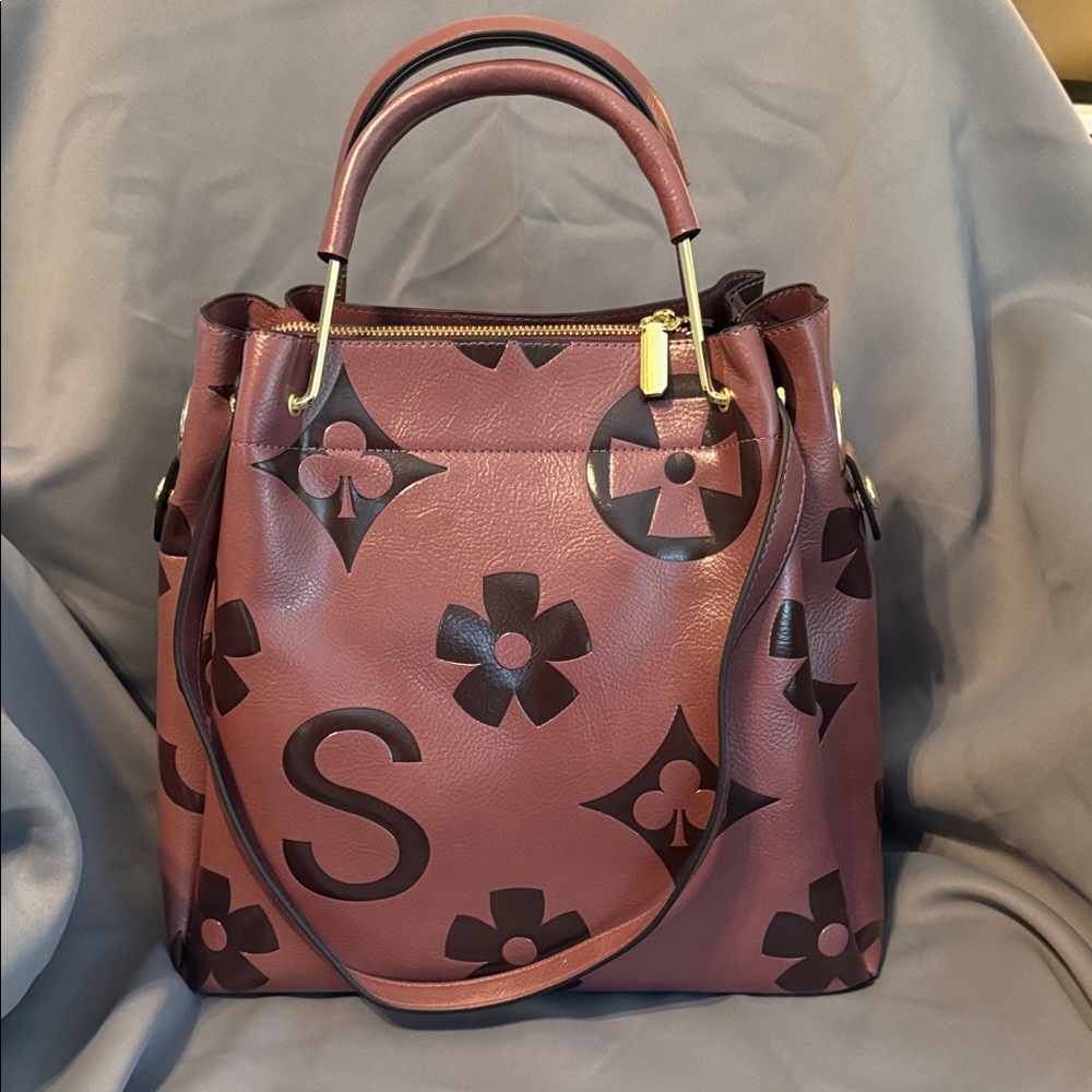 Elegant Plum Shoulder Bag with Black Floral Accents
